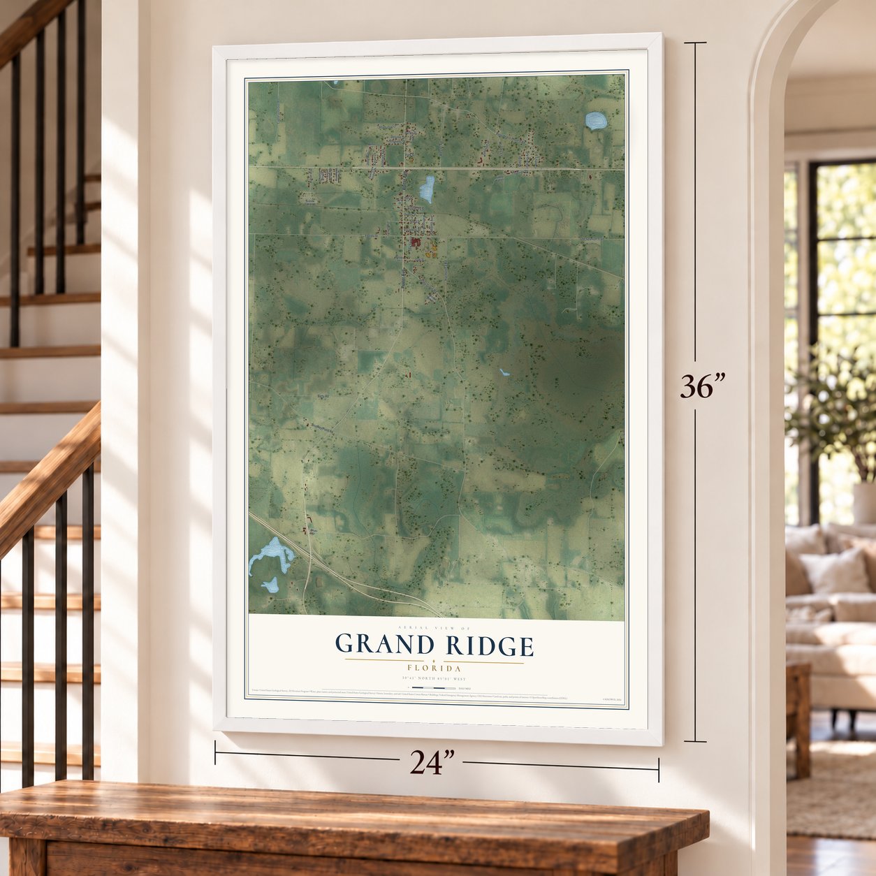 Grand Ridge, Florida map, 24 x 36 inch print in a white frame by a staircase