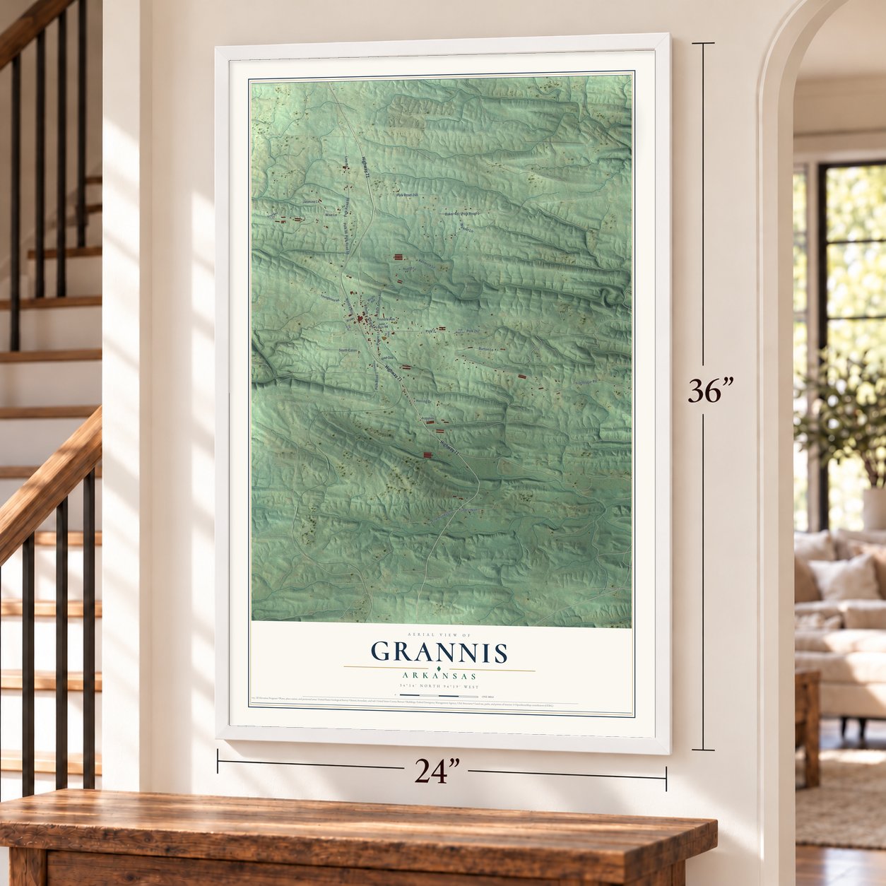 Grannis, Arkansas map, 24 x 36 inch print in a white frame by a staircase