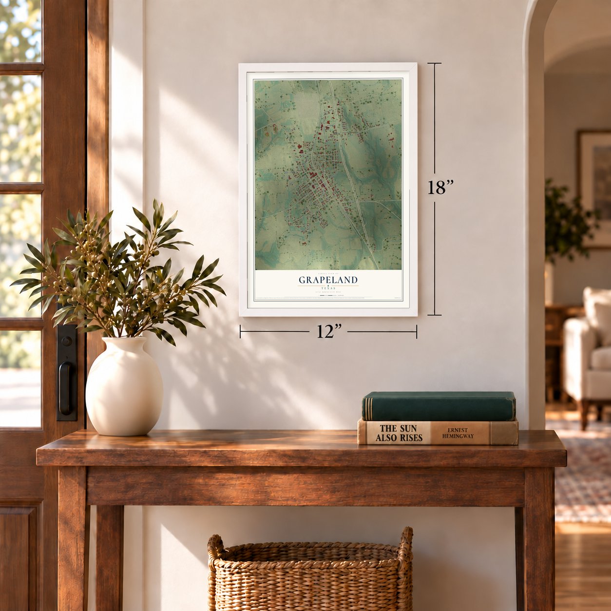 Grapeland, Texas map, 12 x 18 inch print in a white frame in an entryway