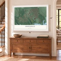 Greenhills, Ohio map, 24 x 36 inch print in a white frame above a dresser by a staircase