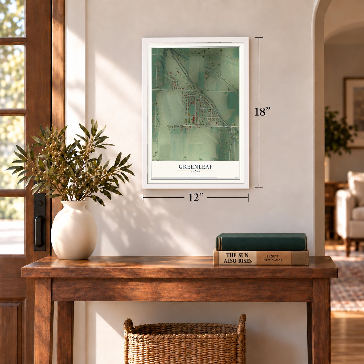 Greenleaf, Idaho map, 12 x 18 inch print in a white frame in an entryway