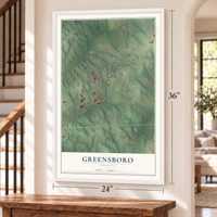 Greensboro, Georgia map, 24 x 36 inch print in a white frame by a staircase