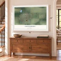 Greensburg, Kansas map, 24 x 36 inch print in a white frame above a dresser by a staircase