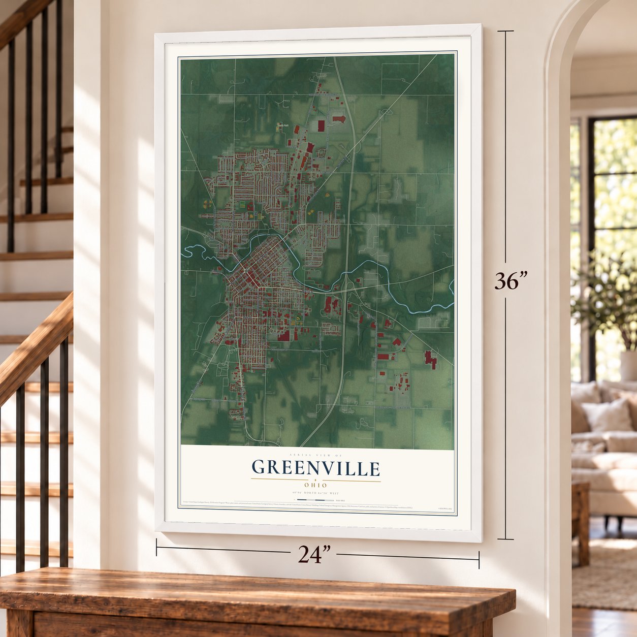 Greenville, Ohio map, 24 x 36 inch print in a white frame by a staircase