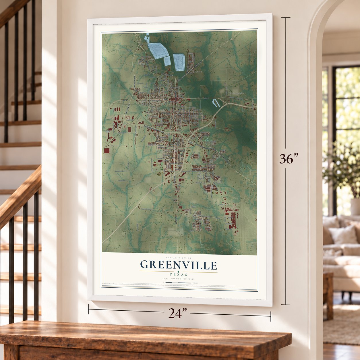 Greenville, Texas map, 24 x 36 inch print in a white frame by a staircase