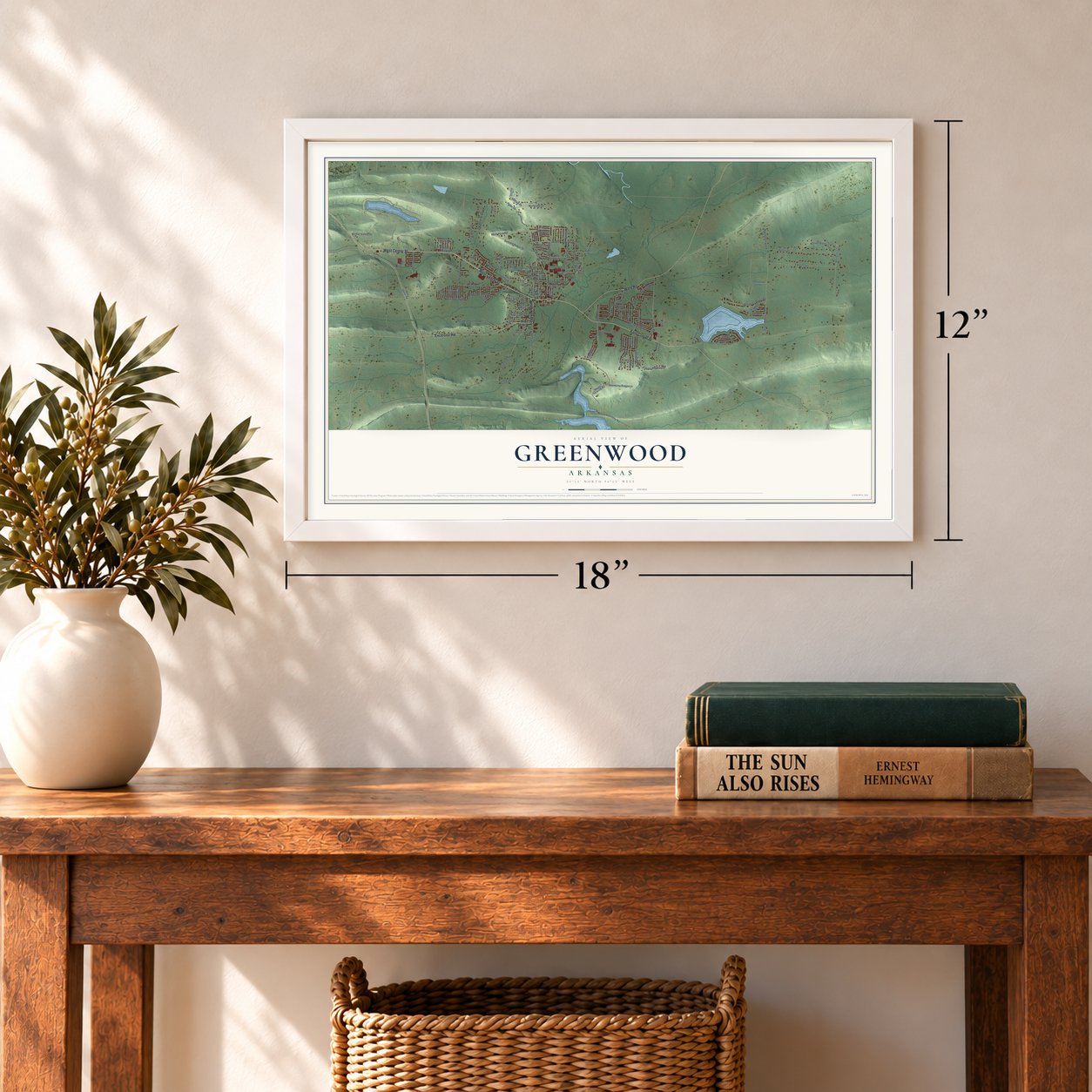 Greenwood, Arkansas map, 12 x 18 inch print in a white frame in an entryway