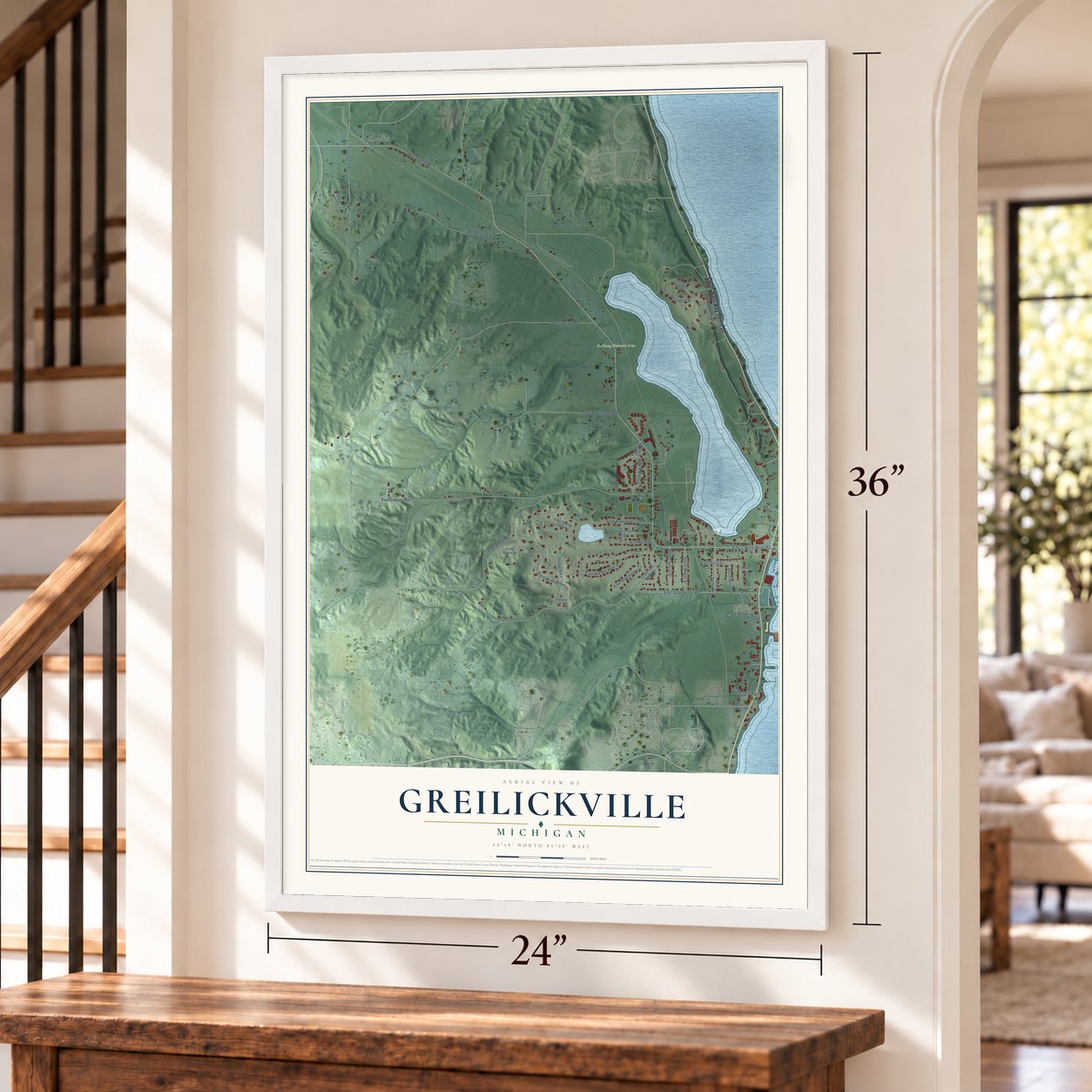 Greilickville, Michigan map, 24 x 36 inch print in a white frame by a staircase