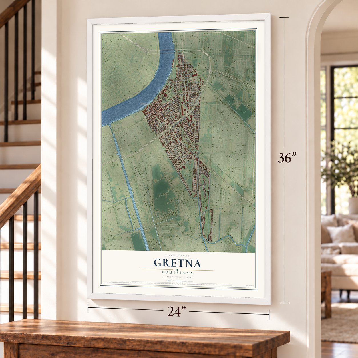 Gretna, Louisiana map, 24 x 36 inch print in a white frame by a staircase