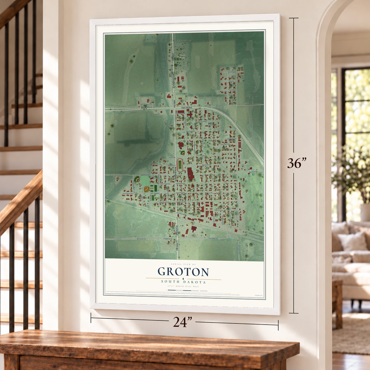 Groton, South Dakota map, 24 x 36 inch print in a white frame by a staircase
