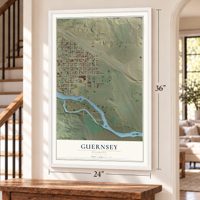 Guernsey, Wyoming map, 24 x 36 inch print in a white frame by a staircase
