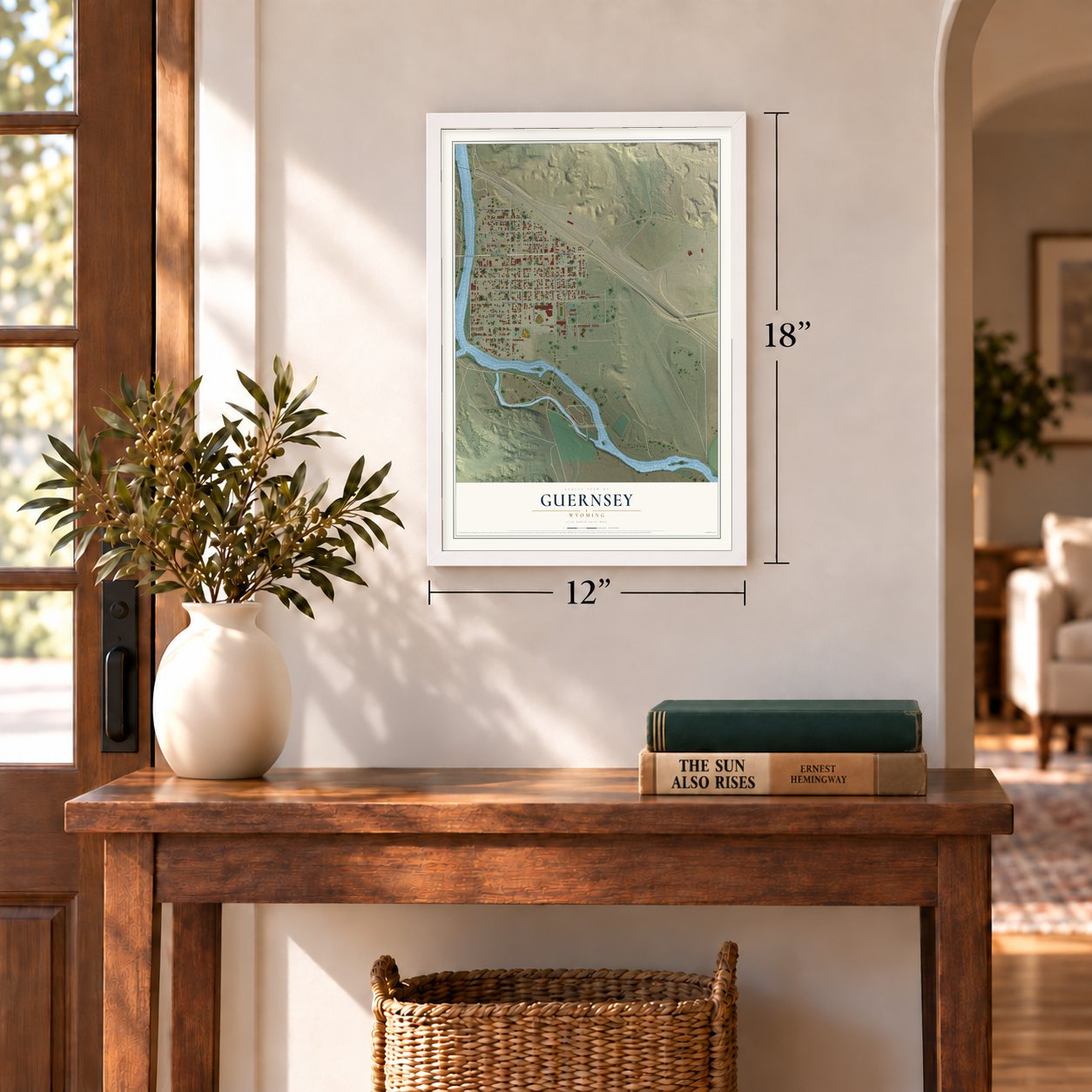 Guernsey, Wyoming map, 12 x 18 inch print in a white frame in an entryway