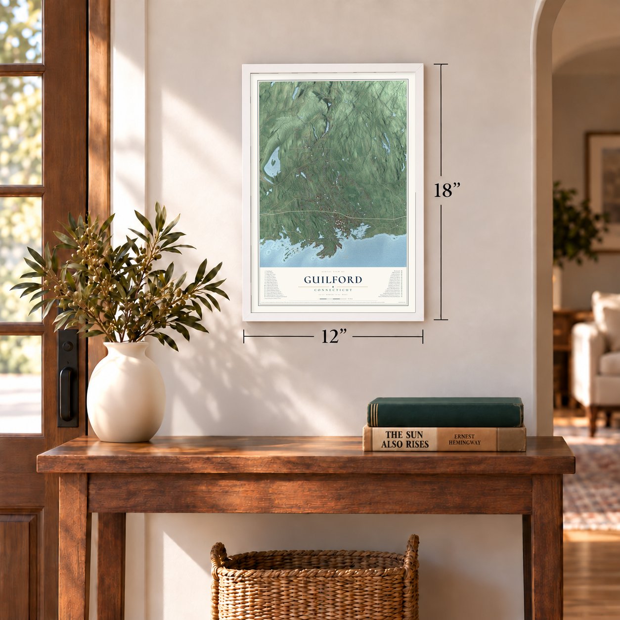 Guilford, Connecticut map, 12 x 18 inch print in a white frame in an entryway