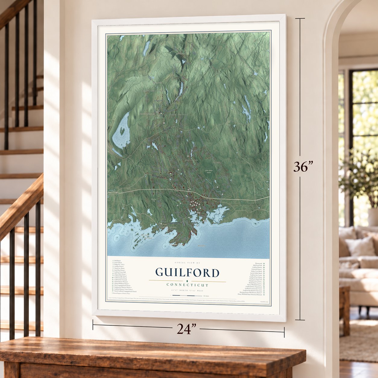 Guilford, Connecticut map, 24 x 36 inch print in a white frame by a staircase