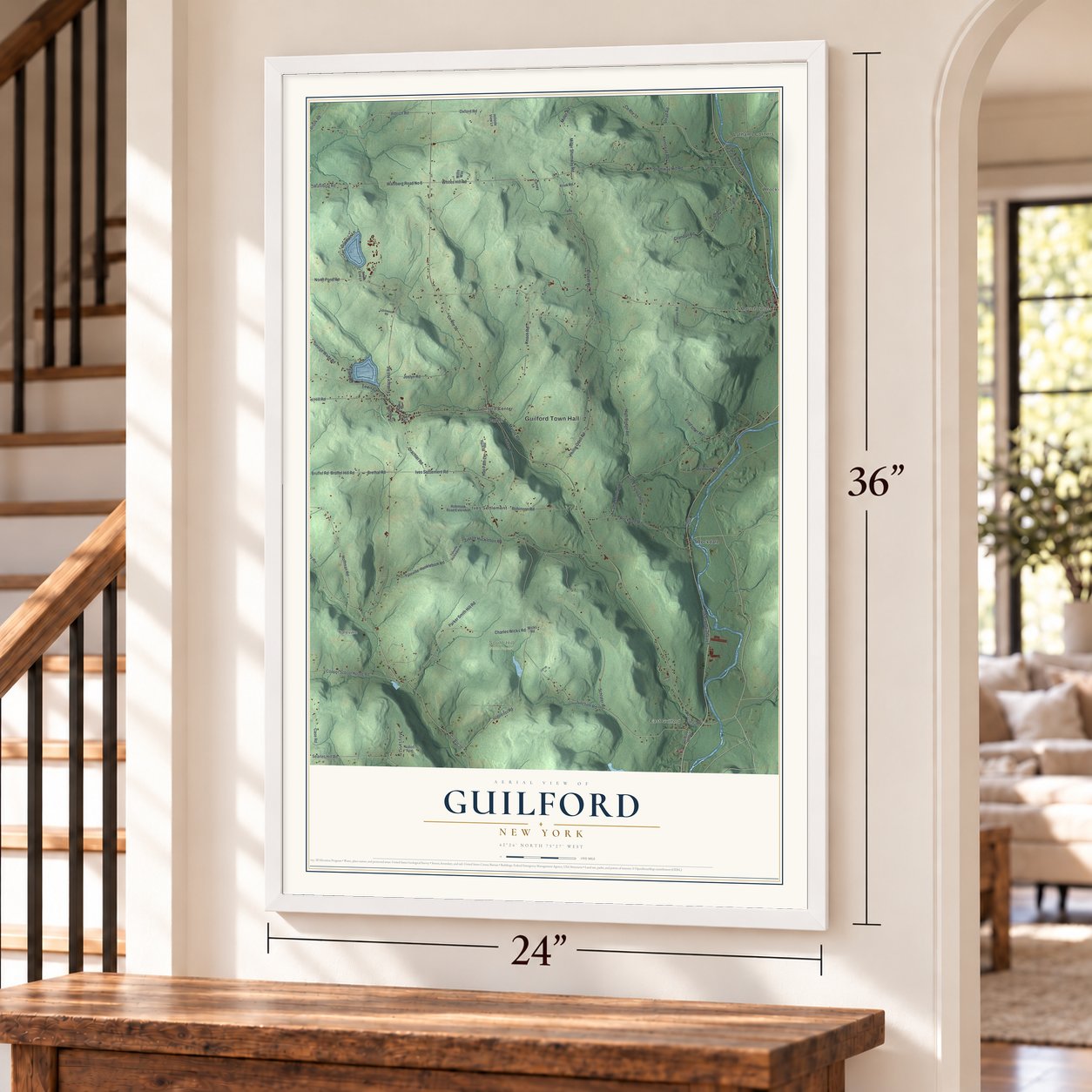 Guilford, New York map, 24 x 36 inch print in a white frame by a staircase