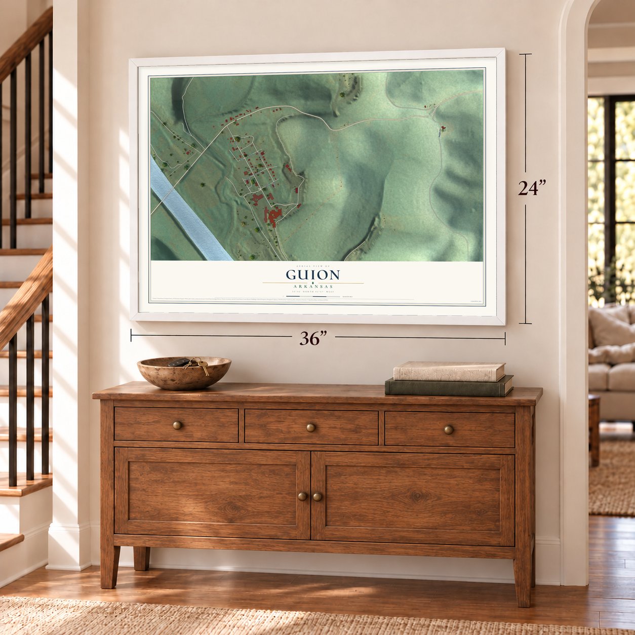 Guion, Arkansas map, 24 x 36 inch print in a white frame above a dresser by a staircase