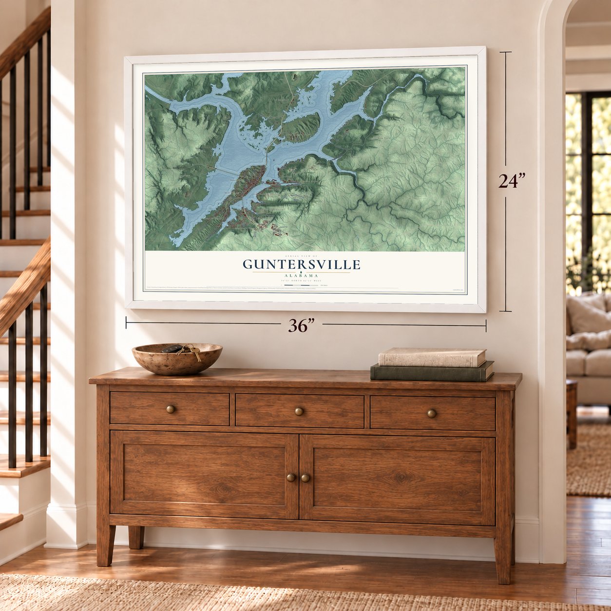 Guntersville, Alabama map, 24 x 36 inch print in a white frame above a dresser by a staircase