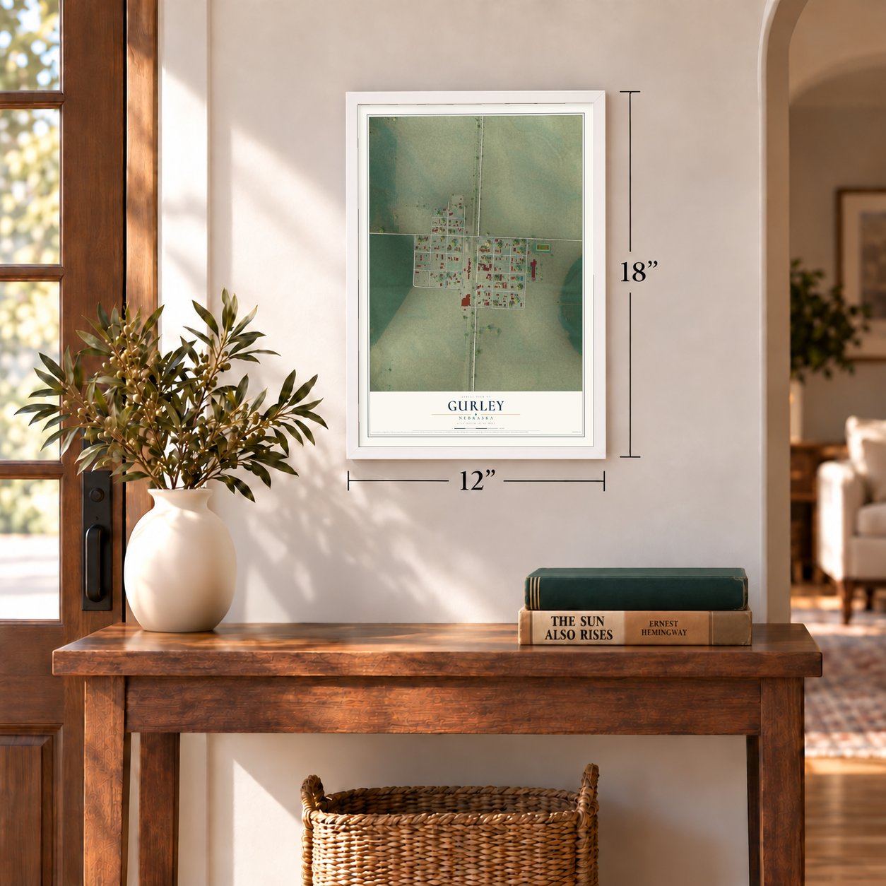 Gurley, Nebraska map, 12 x 18 inch print in a white frame in an entryway