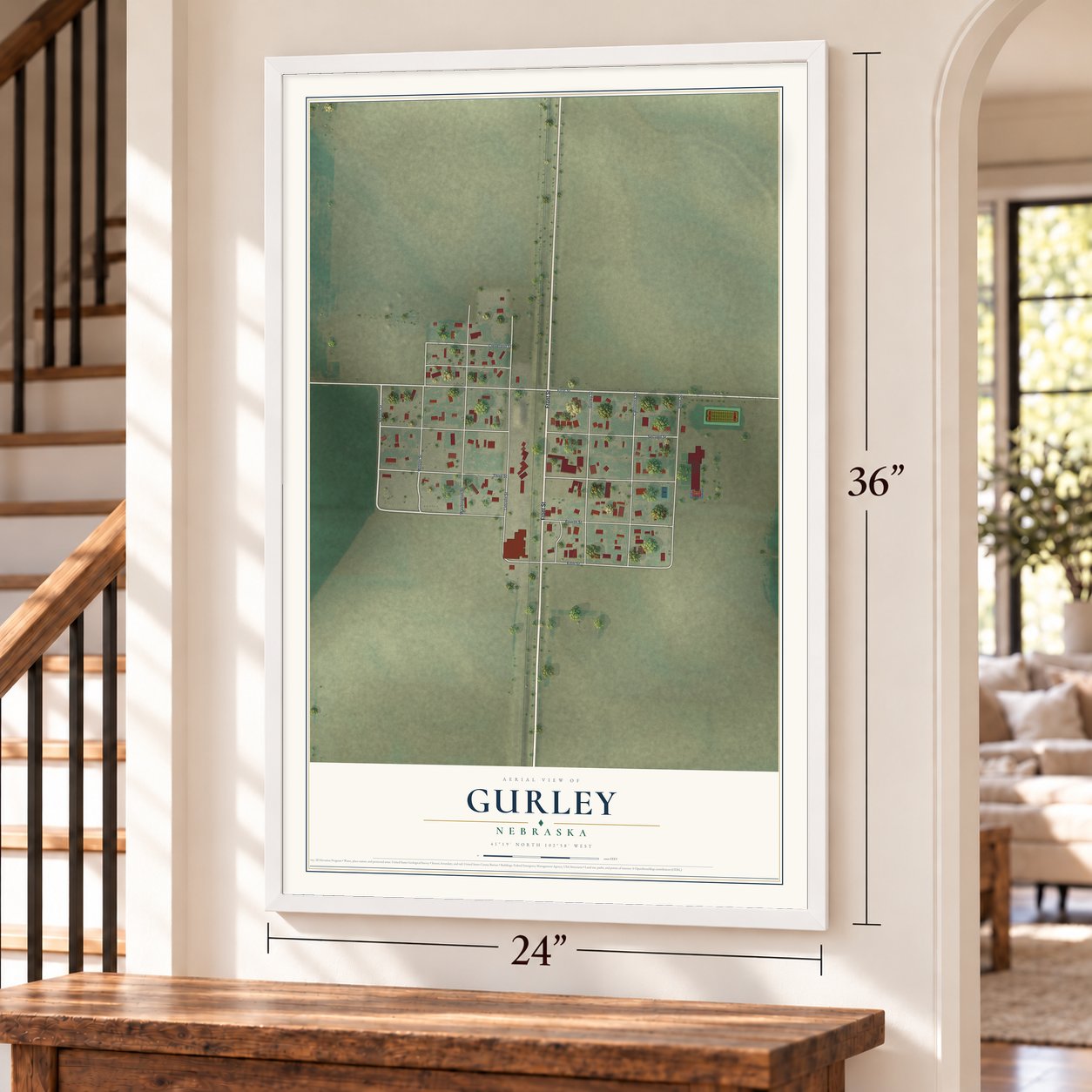 Gurley, Nebraska map, 24 x 36 inch print in a white frame by a staircase