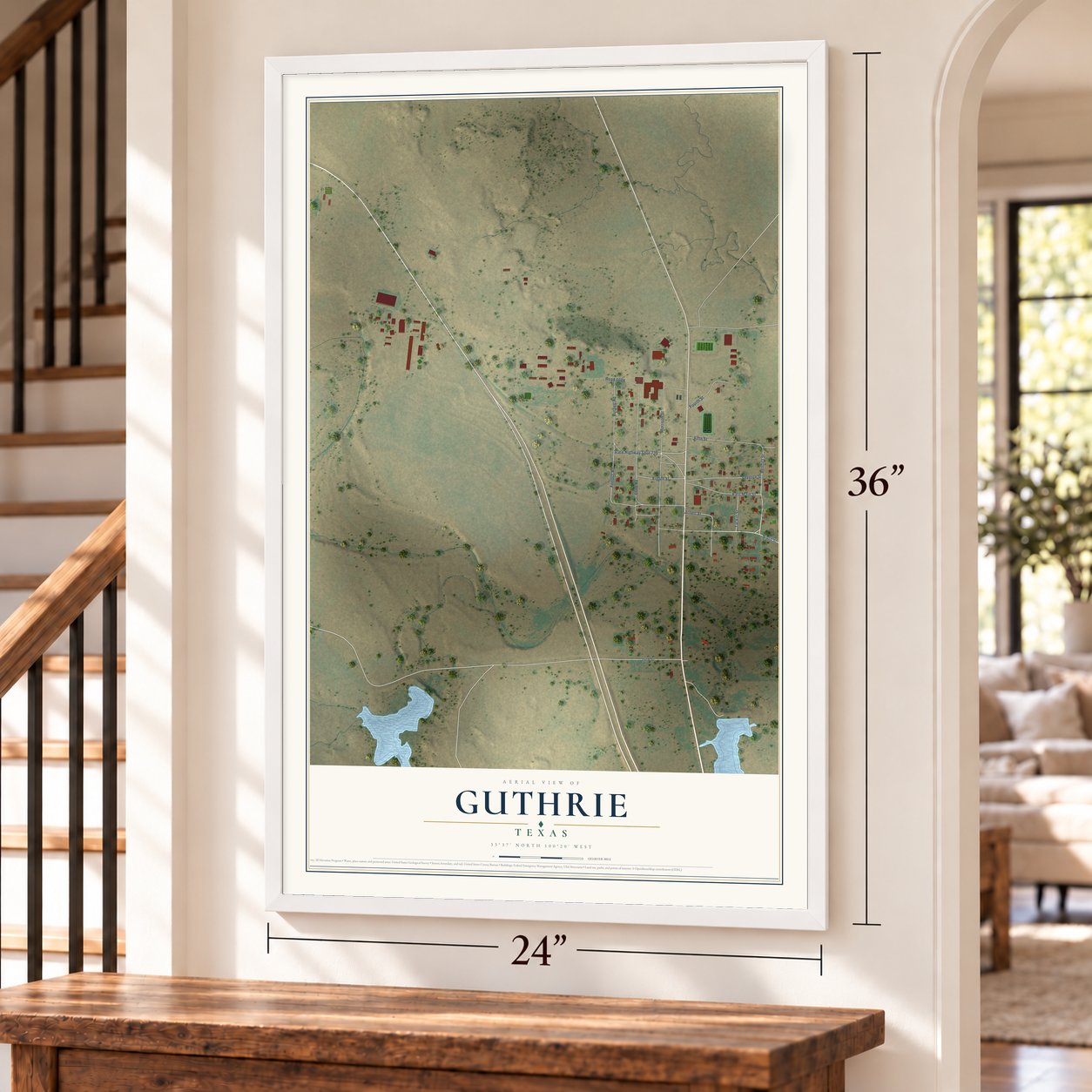 Guthrie, Texas map, 24 x 36 inch print in a white frame by a staircase