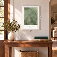 H. Cuellar Estates, Texas map, 12 x 18 inch print in a white frame in an entryway
