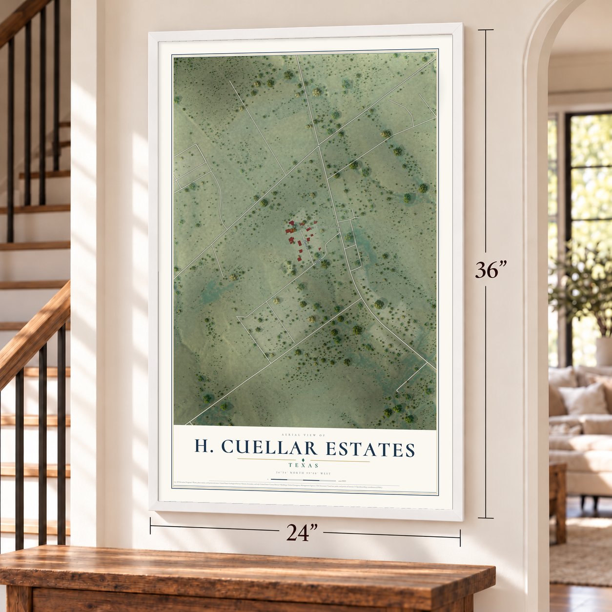 H. Cuellar Estates, Texas map, 24 x 36 inch print in a white frame by a staircase