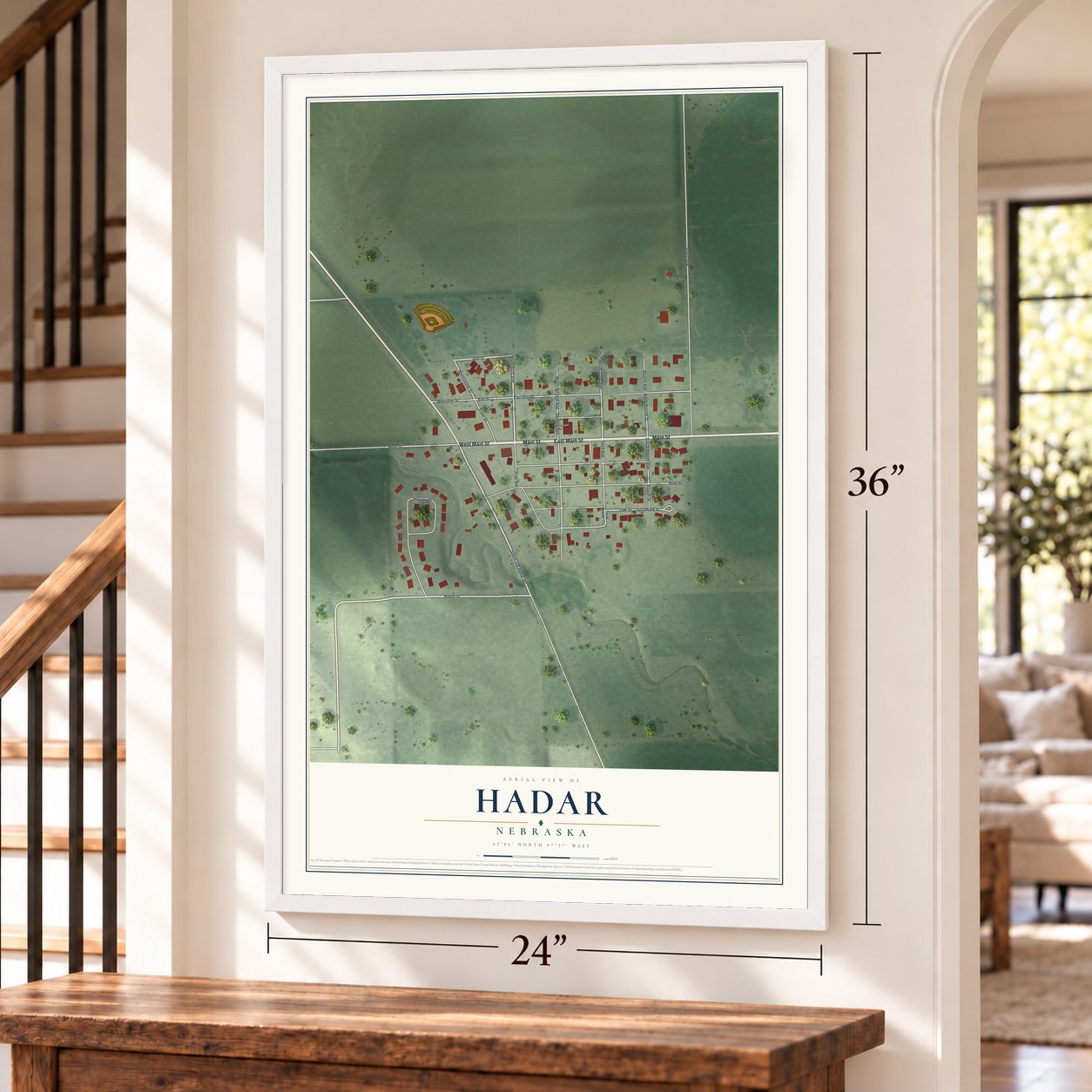 Hadar, Nebraska map, 24 x 36 inch print in a white frame by a staircase