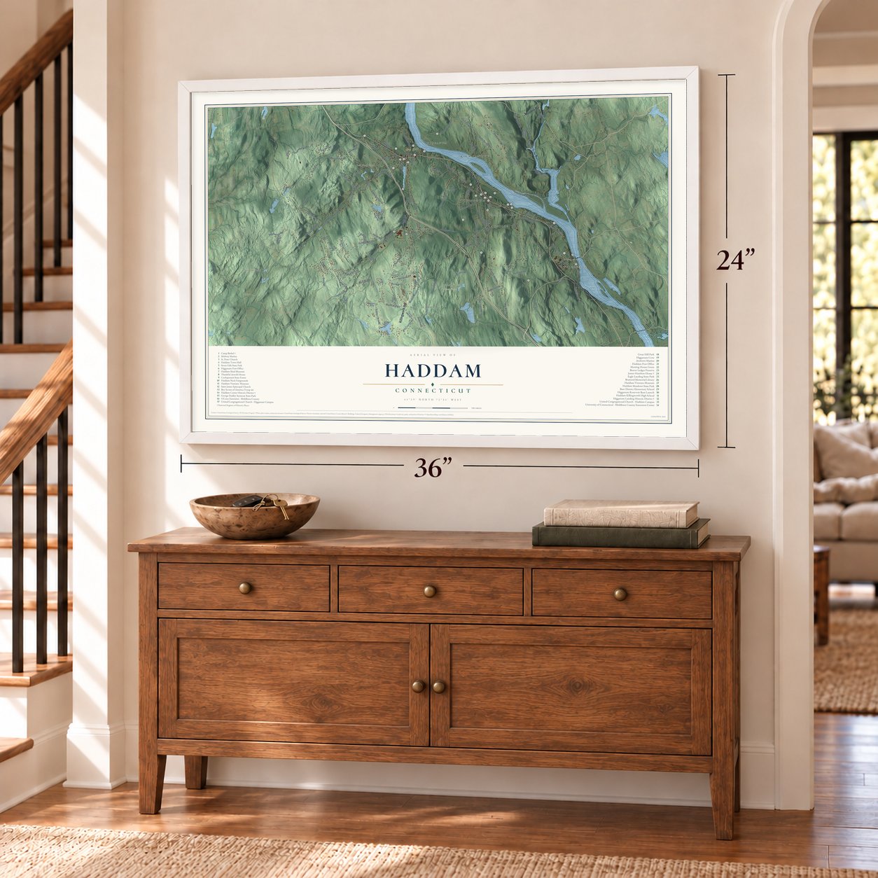 Haddam, Connecticut map, 24 x 36 inch print in a white frame above a dresser by a staircase