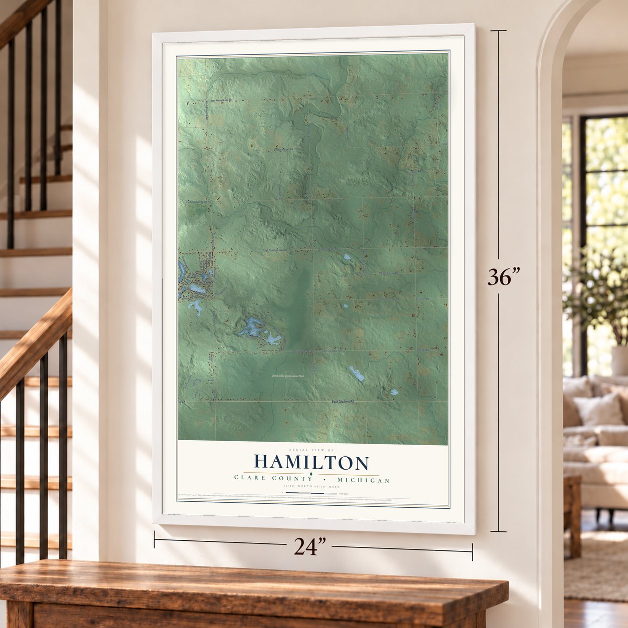 Hamilton, Clare County, Michigan map, 24 x 36 inch print in a white frame by a staircase