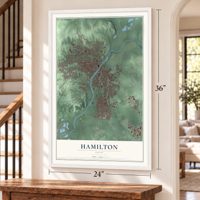 Hamilton, Ohio map, 24 x 36 inch print in a white frame by a staircase
