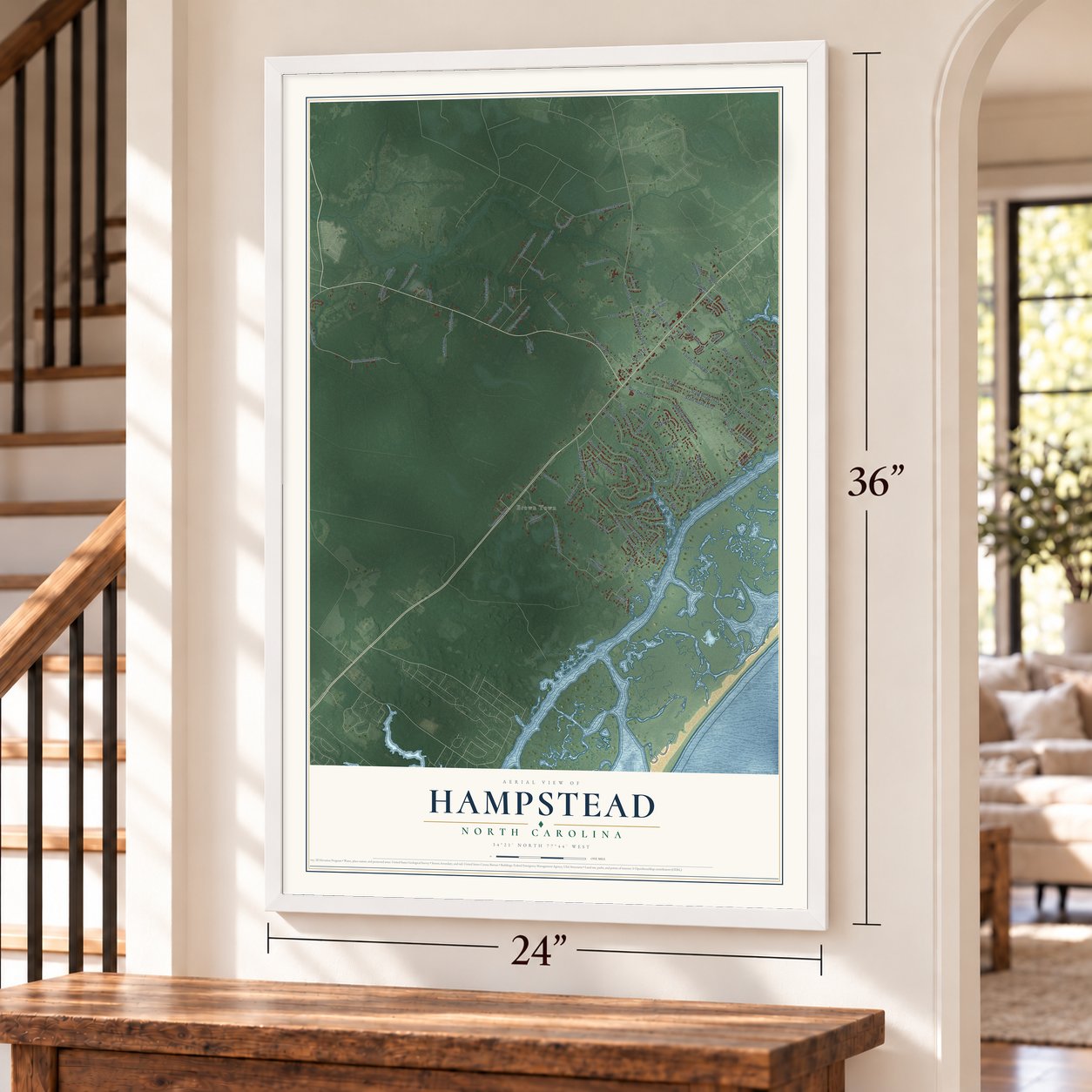 Hampstead, North Carolina map, 24 x 36 inch print in a white frame by a staircase