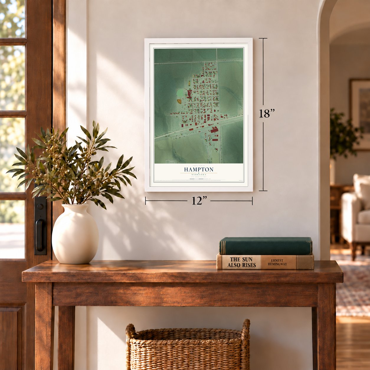 Hampton, Nebraska map, 12 x 18 inch print in a white frame in an entryway