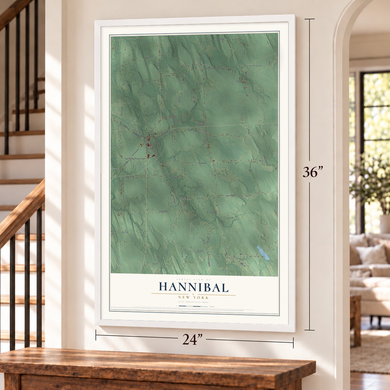 Hannibal, New York map, 24 x 36 inch print in a white frame by a staircase