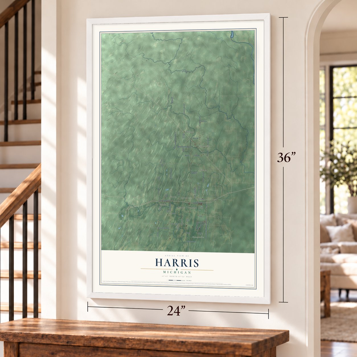 Harris, Michigan map, 24 x 36 inch print in a white frame by a staircase