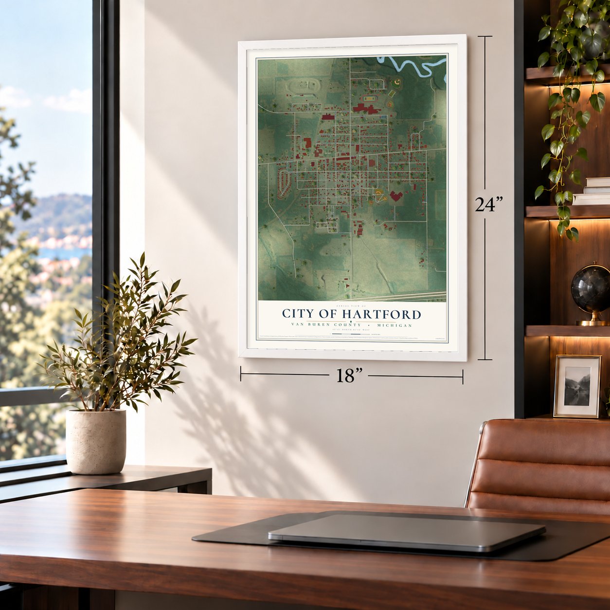 Hartford, Michigan map, 18 x 24 inch print in a white frame in a home office