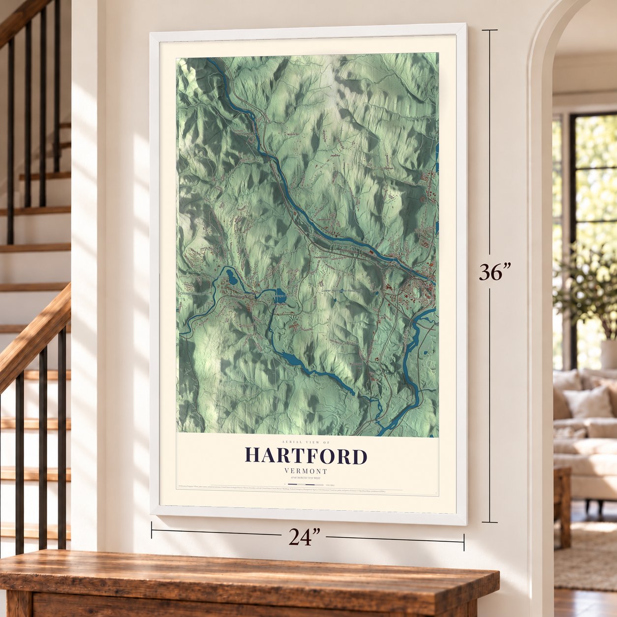 Hartford, Vermont map, 24 x 36 inch print in a white frame by a staircase