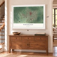 Hartington, Nebraska map, 24 x 36 inch print in a white frame above a dresser by a staircase