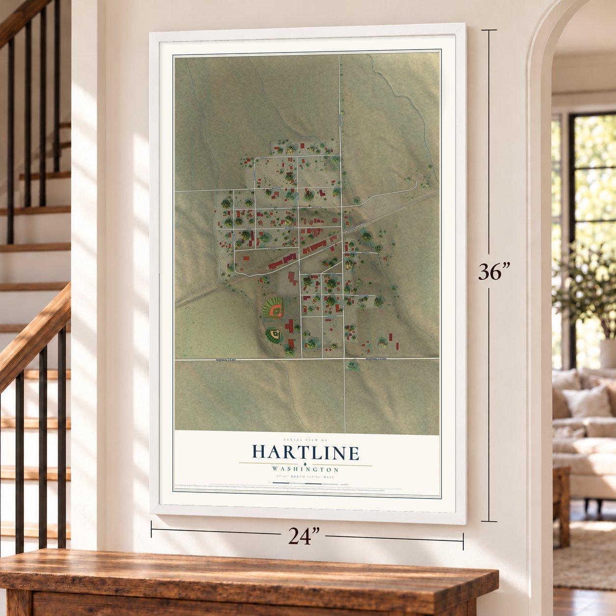 Hartline, Washington map, 24 x 36 inch print in a white frame by a staircase