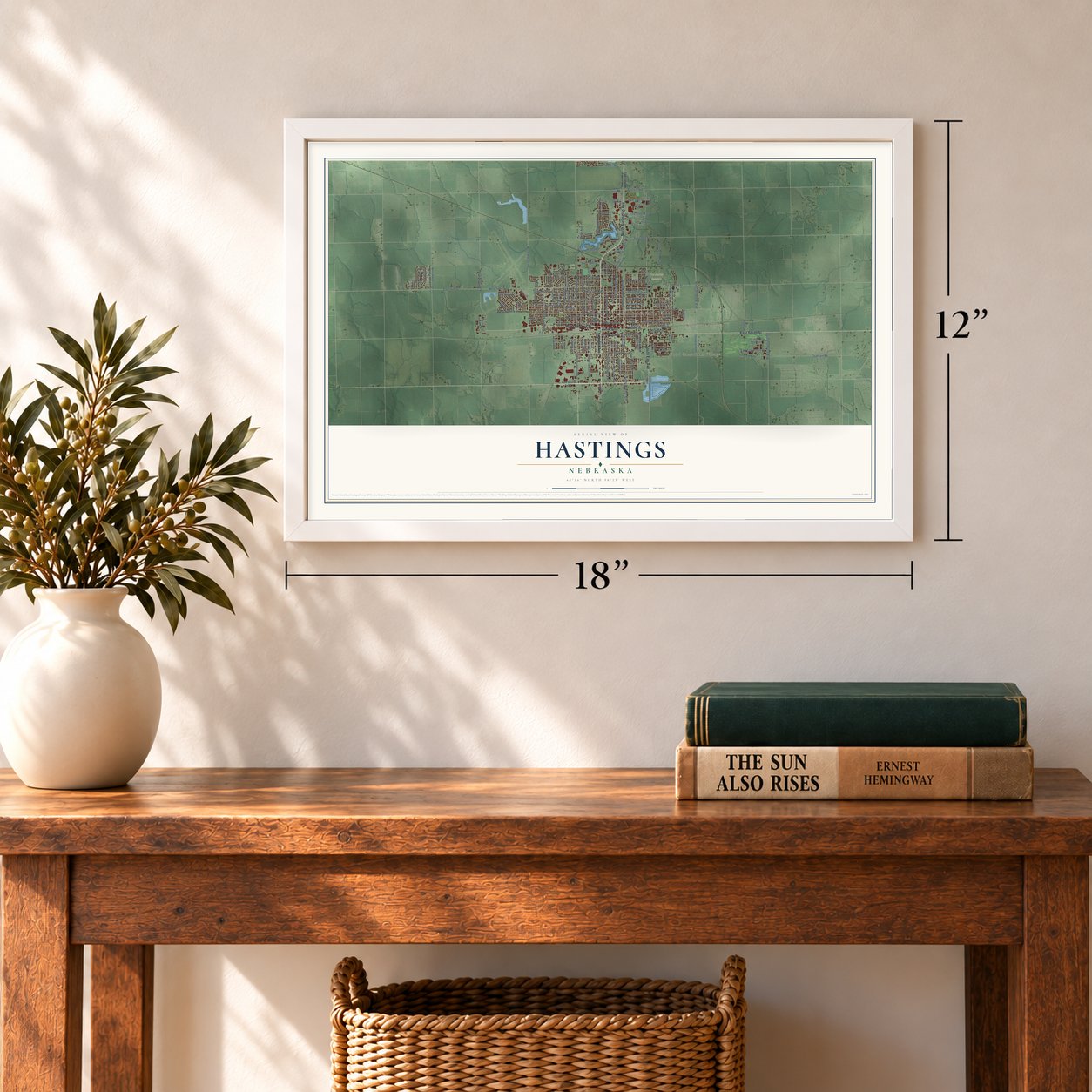 Hastings, Nebraska map, 12 x 18 inch print in a white frame in an entryway