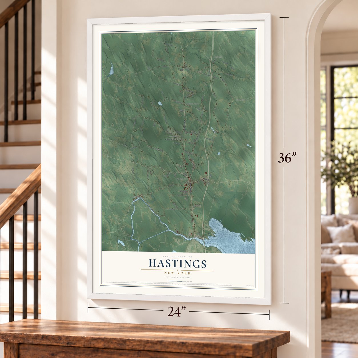 Hastings, New York map, 24 x 36 inch print in a white frame by a staircase