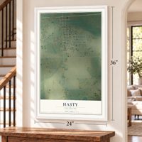 Hasty, Colorado map, 24 x 36 inch print in a white frame by a staircase