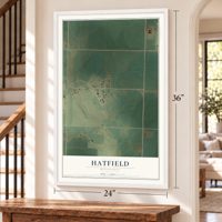 Hatfield, Minnesota map, 24 x 36 inch print in a white frame by a staircase