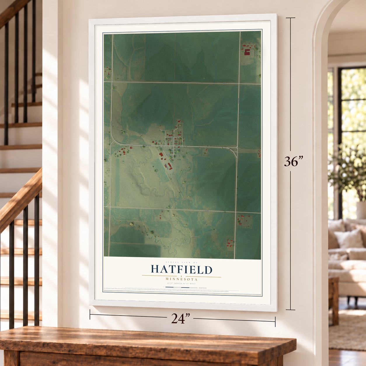 Hatfield, Minnesota map, 24 x 36 inch print in a white frame by a staircase