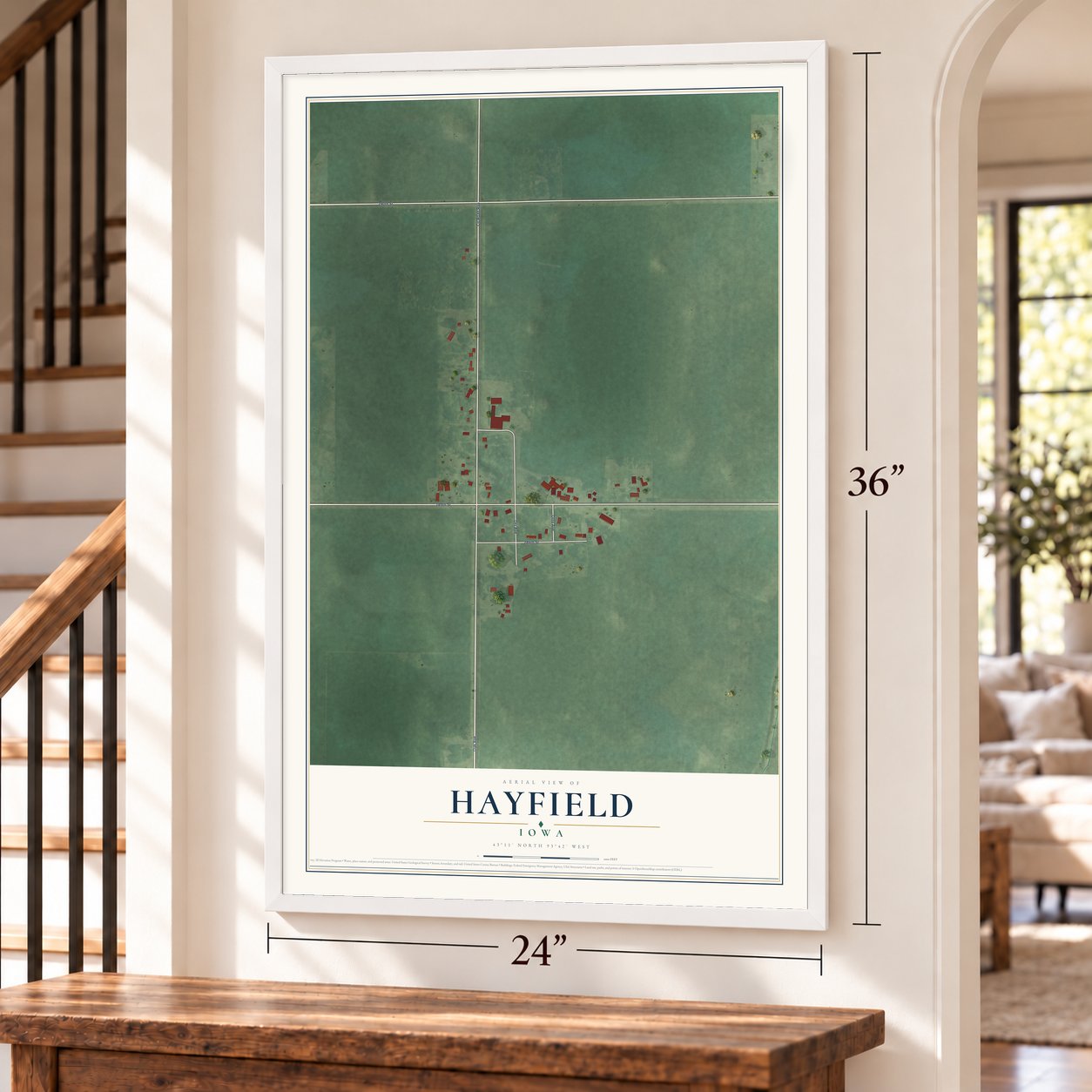 Hayfield, Iowa map, 24 x 36 inch print in a white frame by a staircase