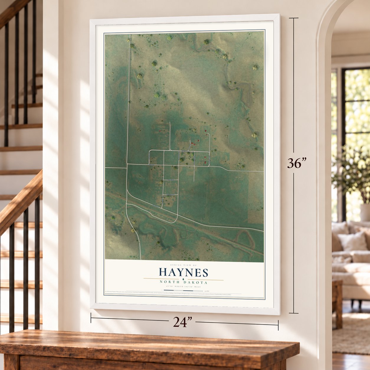 Haynes, North Dakota map, 24 x 36 inch print in a white frame by a staircase