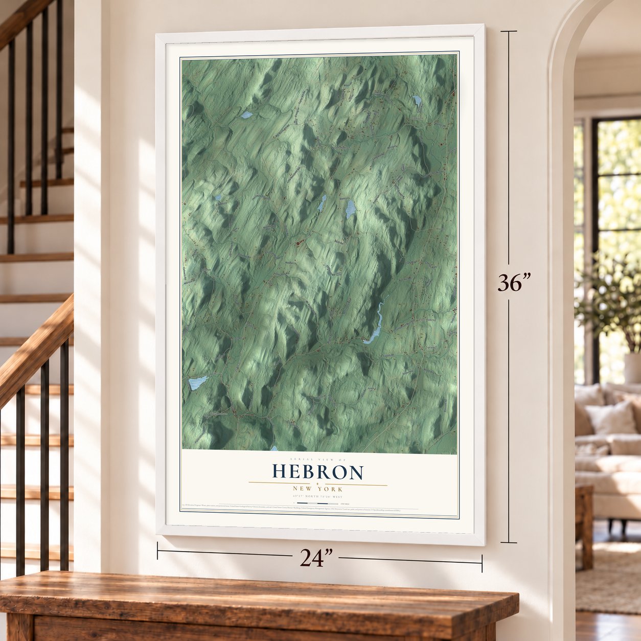Hebron, New York map, 24 x 36 inch print in a white frame by a staircase