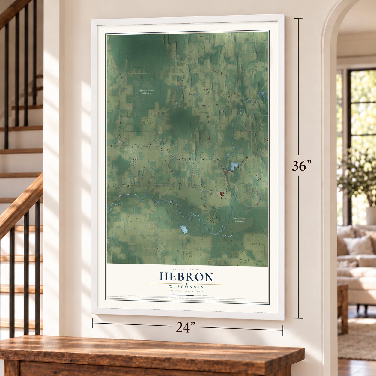 Hebron, Wisconsin map, 24 x 36 inch print in a white frame by a staircase