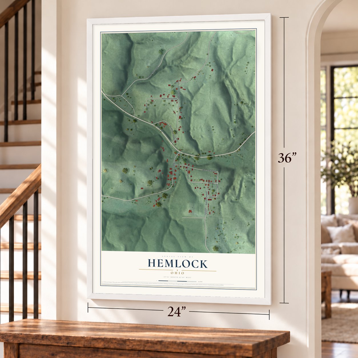 Hemlock, Ohio map, 24 x 36 inch print in a white frame by a staircase