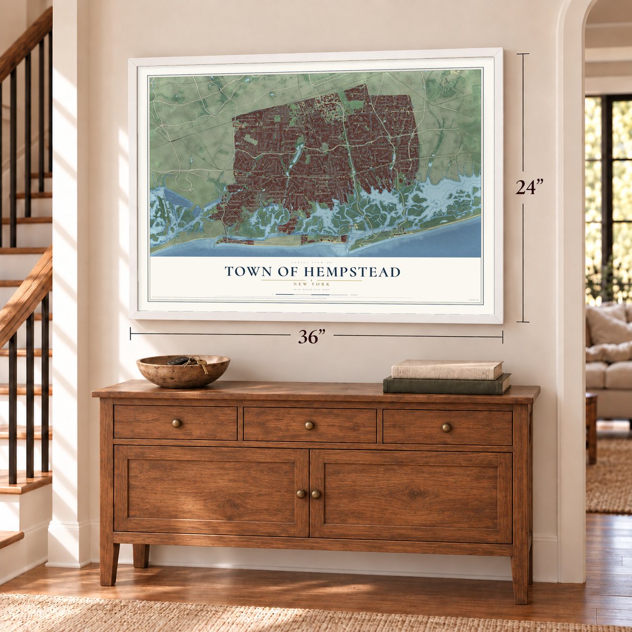 Town of Hempstead, New York map, 24 x 36 inch print in a white frame above a dresser by a staircase
