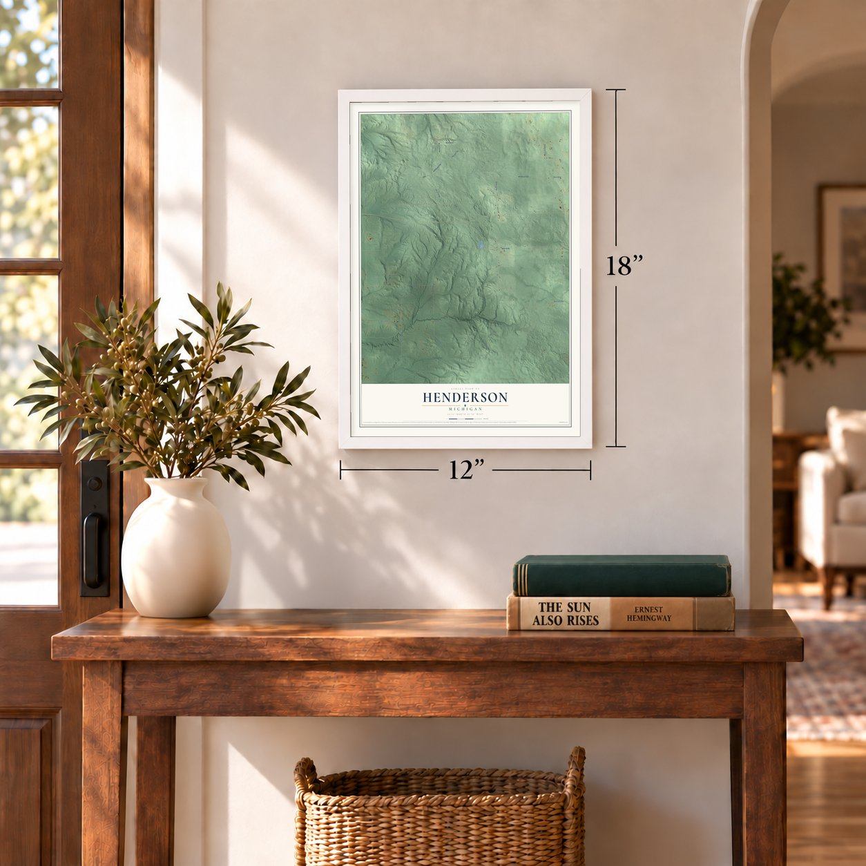 Henderson, Michigan map, 12 x 18 inch print in a white frame in an entryway