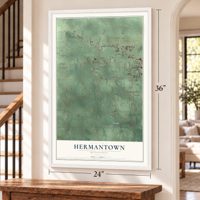 Hermantown, Minnesota map, 24 x 36 inch print in a white frame by a staircase